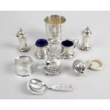 An early twentieth century silver four piece silver condiment set,