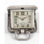 A small silver cased folding travel clock,
