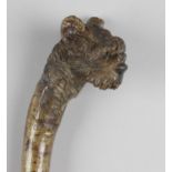 A late 19th century carved wooden walking cane,