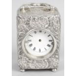 A Victorian hallmarked English sterling silver cased miniature carriage clock,