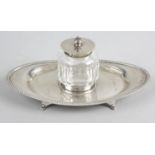 A late Victorian silver mounted glass ink pot,