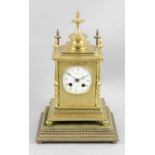 A 19th century gilt metal cased mantel clock,