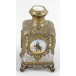 A 19th century Palais Royale pierced gilt metal mounted glass scent bottle with hinged opening