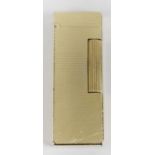 A Dunhill gold plated cigarette lighter,