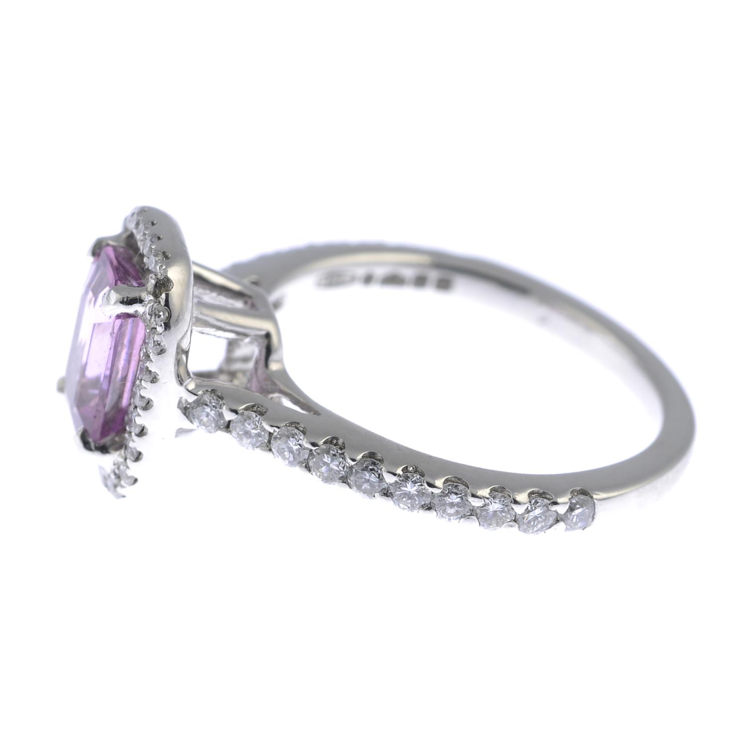 A platinum sapphire and diamond cluster ring. - Image 4 of 4