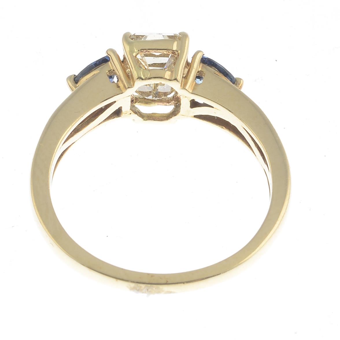 A 14ct gold diamond and sapphire three-stone ring. - Image 2 of 3