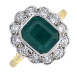 An 18ct gold emerald and diamond cluster ring.