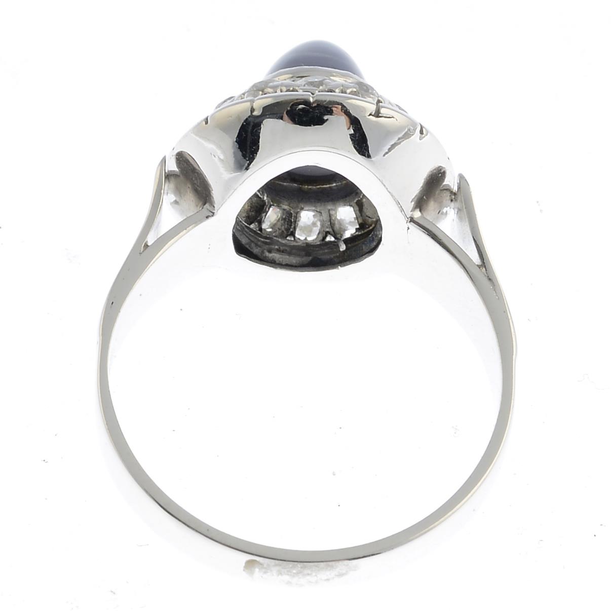 A star sapphire and diamond cluster ring. - Image 2 of 3