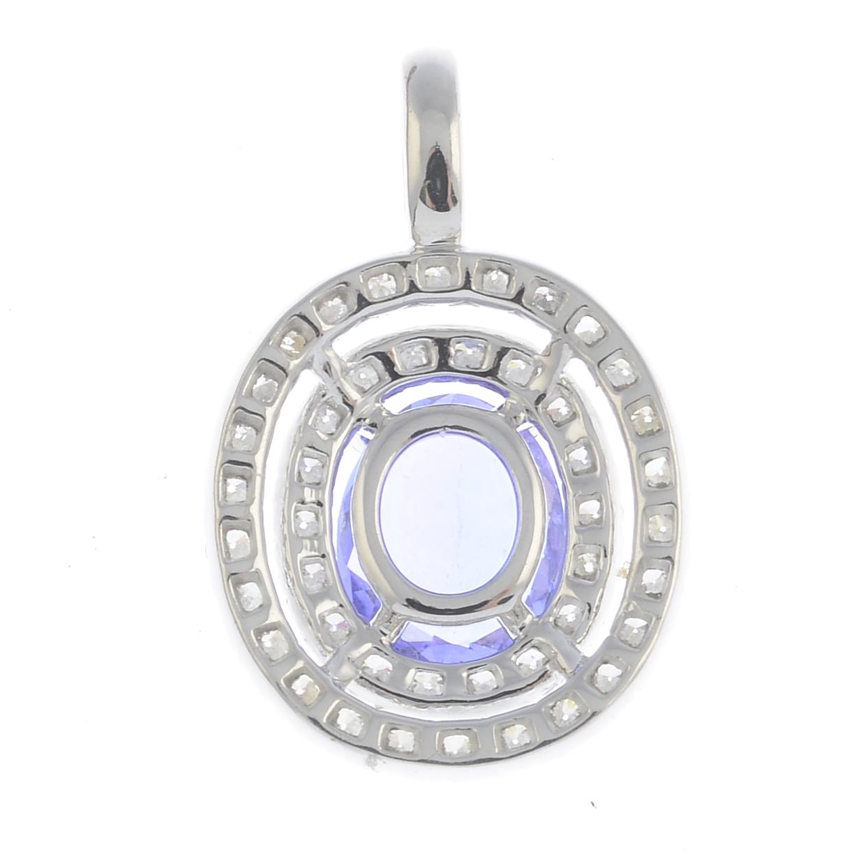 A tanzanite and diamond pendant. - Image 2 of 2