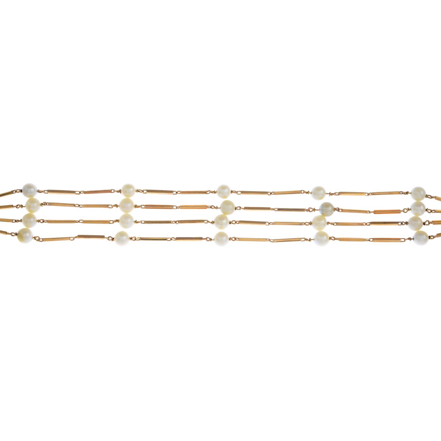 An 18ct gold cultured pearl multi-row bracelet.