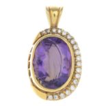 An amethyst and diamond pendant.