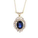 A sapphire and diamond pendant.