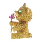 An 18ct gold gem-set bear brooch.