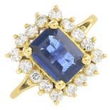 A sapphire and diamond cluster ring.