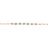 An early 20th century pearl, imitation pearl and diamond bracelet.