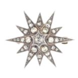 An early 20th century silver and gold diamond star brooch.