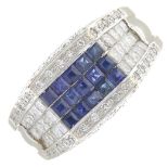 A sapphire and diamond dress ring.