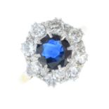 A 9ct gold sapphire and diamond cluster ring.