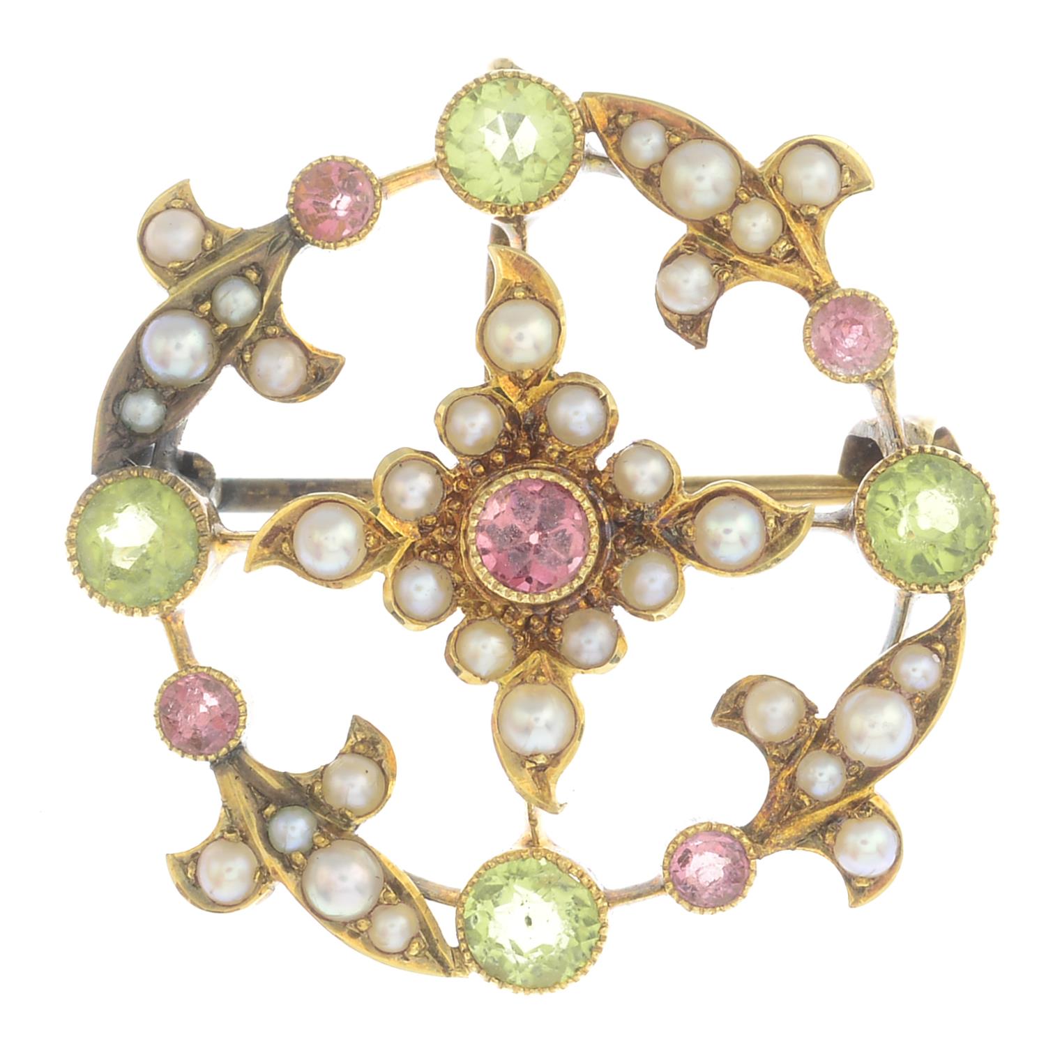 An early 20th century 15ct gold gem-set brooch.