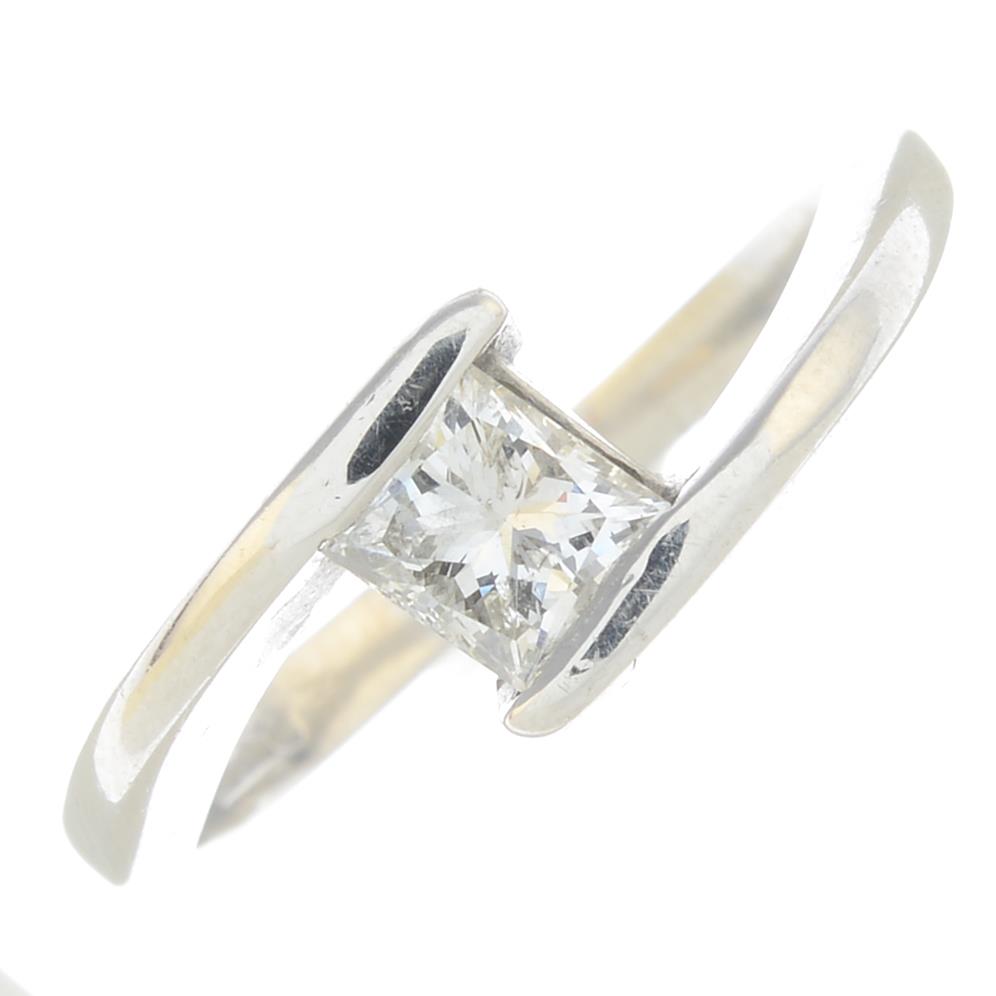 A platinum diamond single-stone ring.