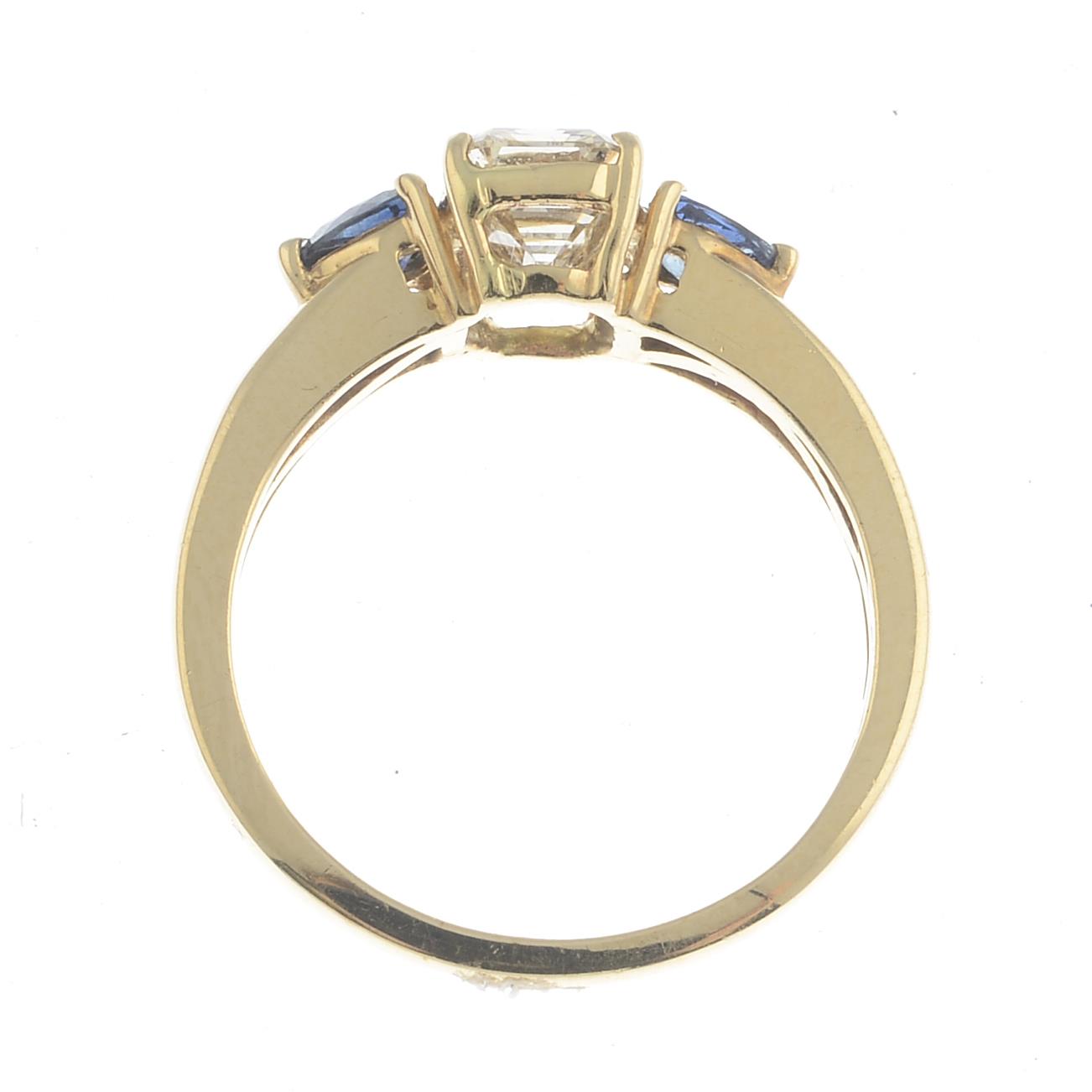 A 14ct gold diamond and sapphire three-stone ring. - Image 3 of 3