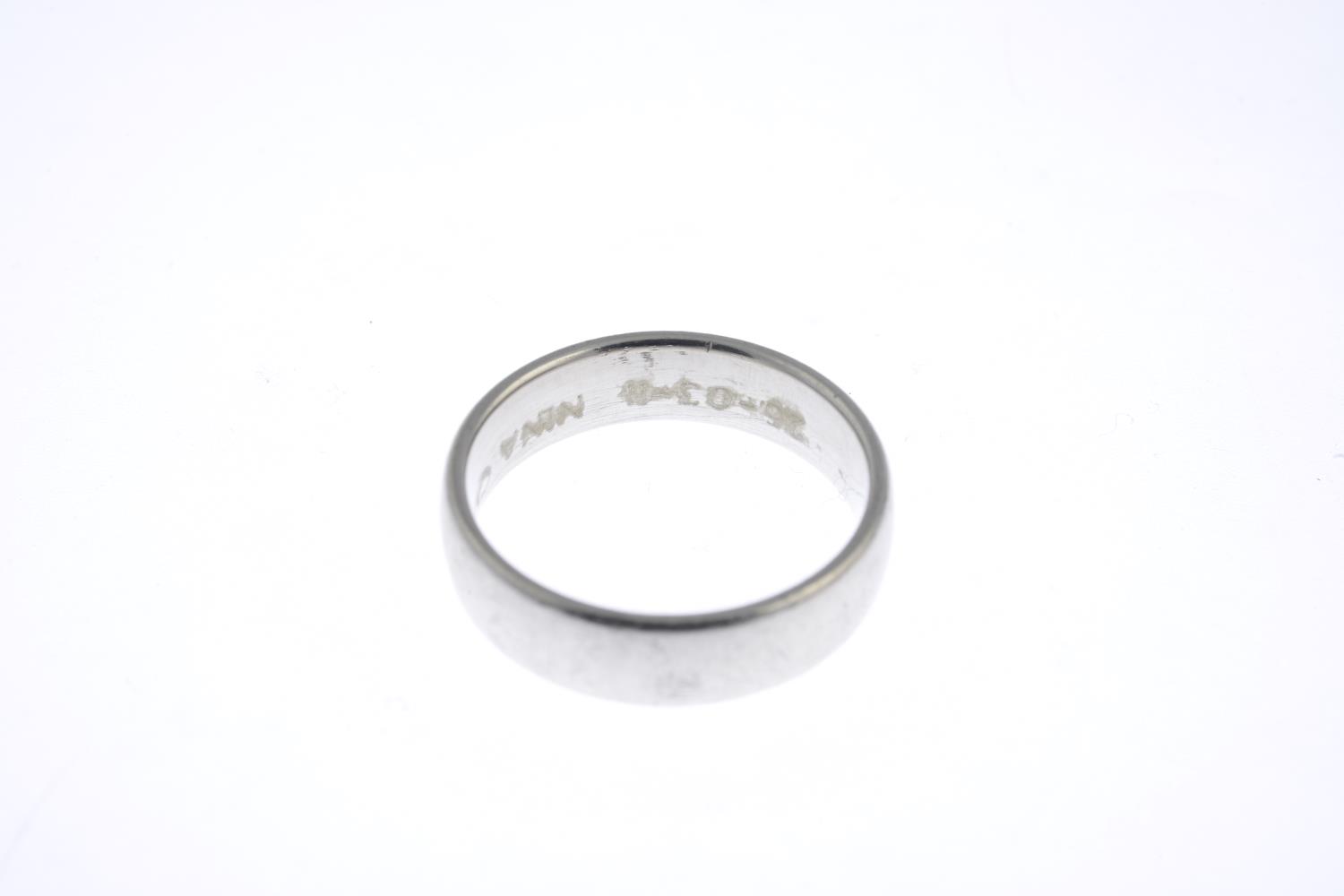 A platinum plain band ring. - Image 3 of 3