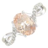 A morganite and diamond dress ring.