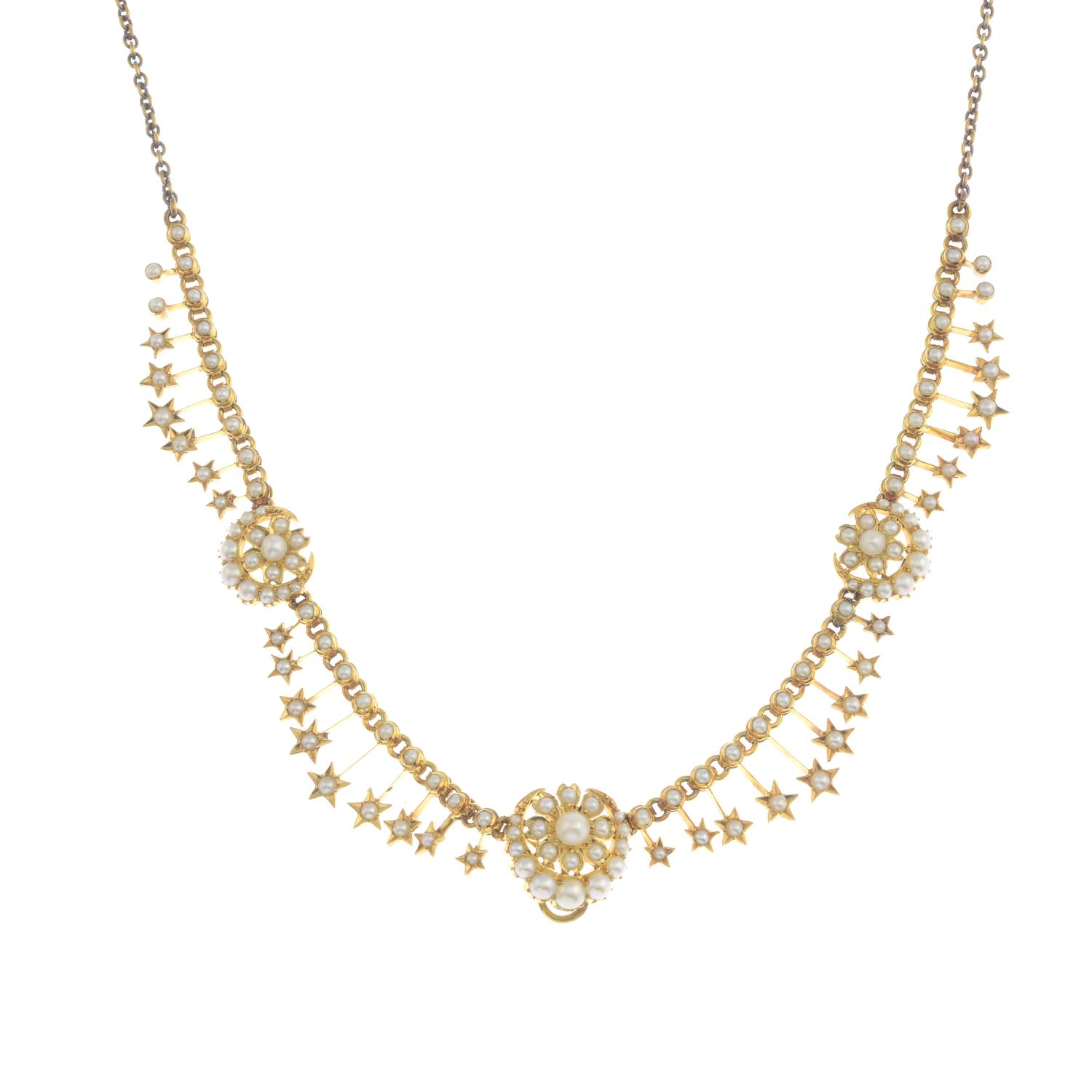 An early 20th century gold split and seed pearl necklace.