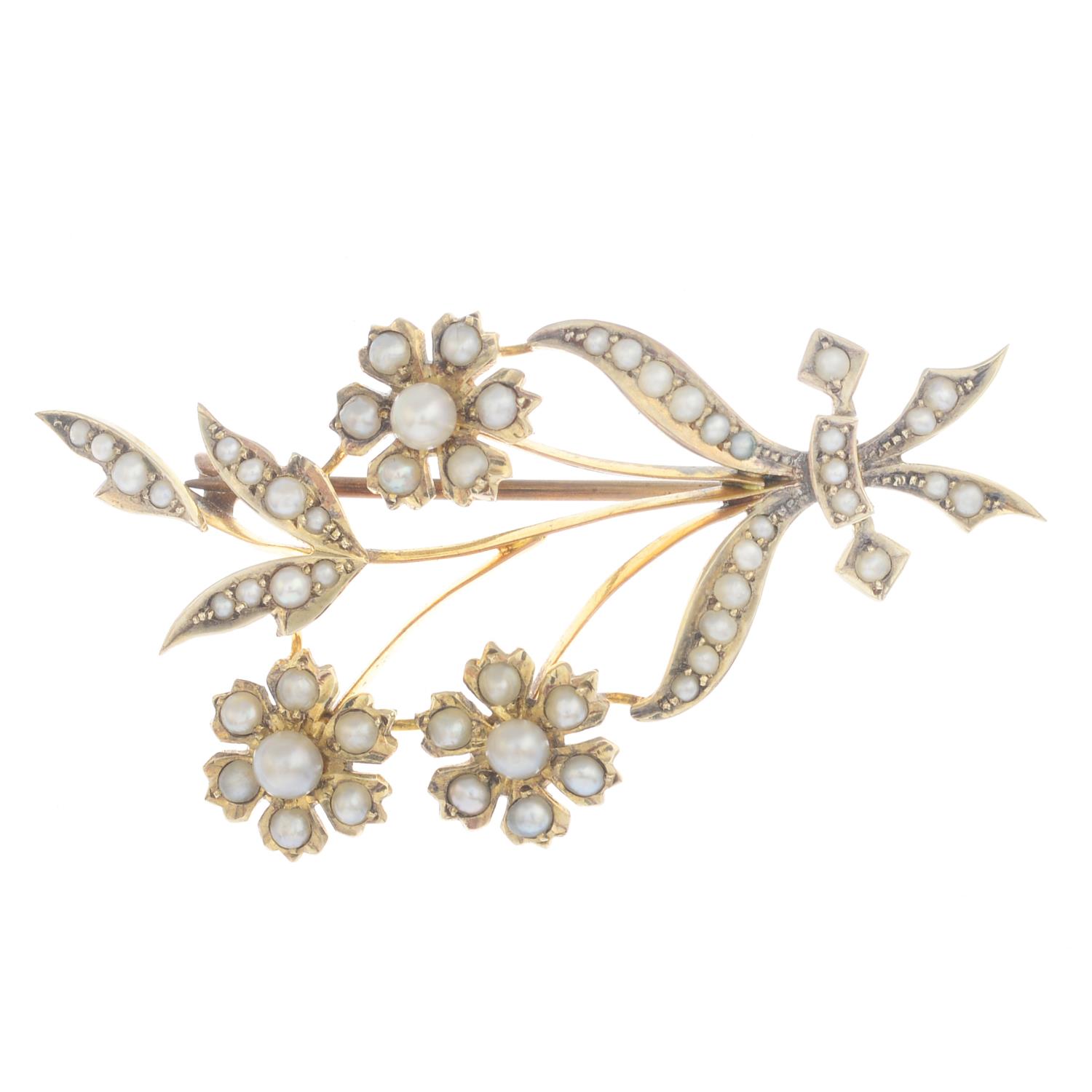 An early 20th century 9ct gold seed and split pearl brooch and a diamond and split pearl ring.