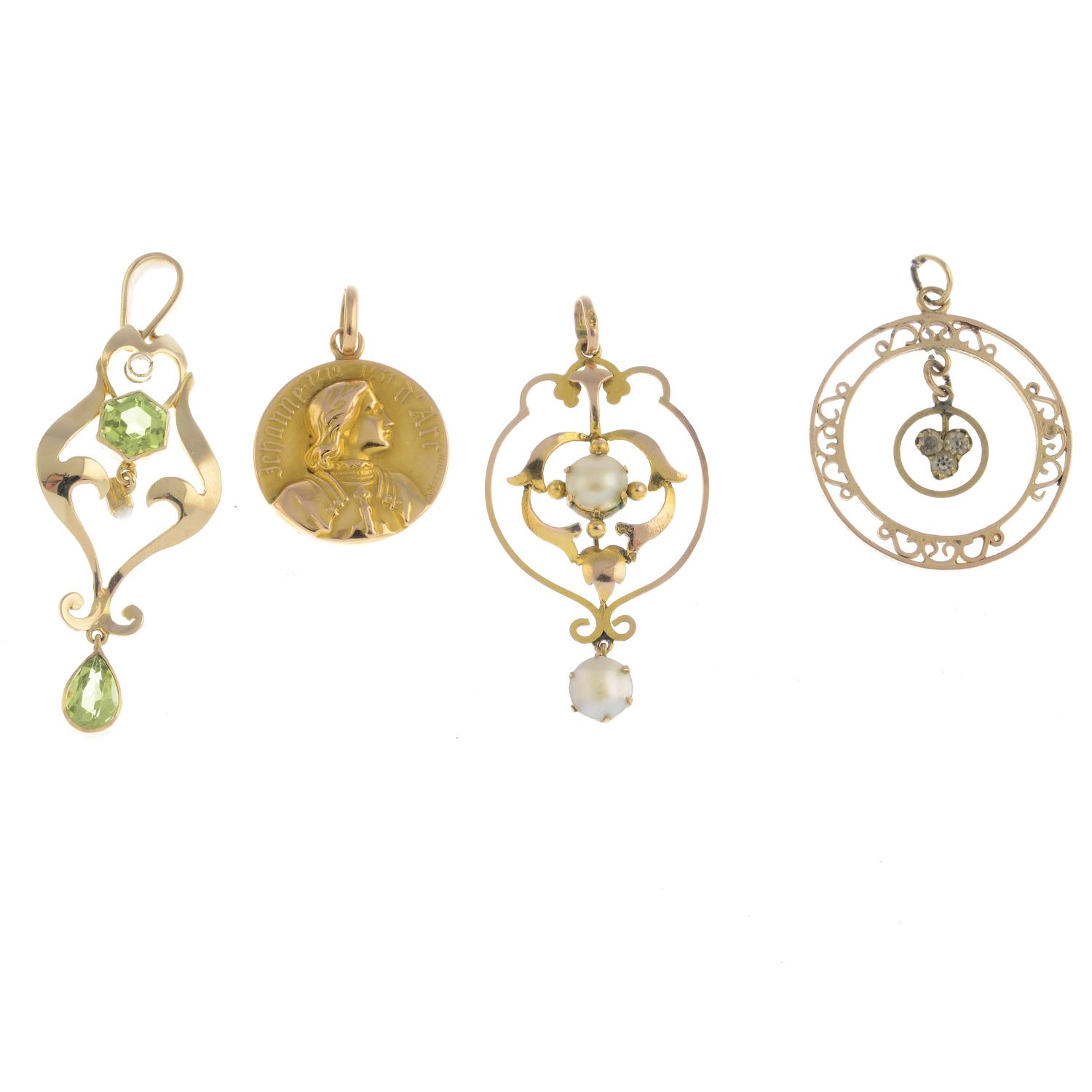 A selection of four early 20th century gold pendants. - Image 2 of 2
