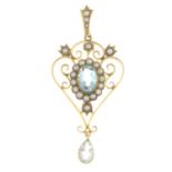 An early 20th century 15ct gold aquamarine and split pearl pendant.