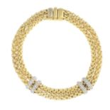 FOPE - an 18ct gold diamond 'Maori' bracelet.