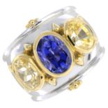 THEO FENNELL - an 18ct gold sapphire three-stone bombe ring.