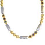 GARRARD - an 18ct gold multi-gem necklace.