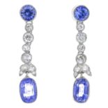 A pair of sapphire and diamond earrings.