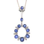 An early 20th century silver and gold, sapphire and diamond pendant.
