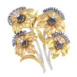 A 1940s 18ct gold and platinum, sapphire and diamond double clip brooch.