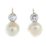 A pair of natural pearl and diamond earrings.