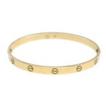 CARTIER - an 18ct gold 'Love' bangle.