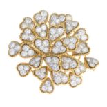 VAN CLEEF & ARPELS - a 1970s platinum and 18ct gold diamond foliate brooch.