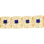 A late 20th century 14ct gold lapis lazuli bracelet.