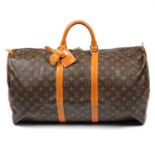 LOUIS VUITTON - a Monogram Keepall 55 luggage bag.