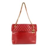 CHANEL - a vintage red lambskin leather Grand Shopping Tote XL.