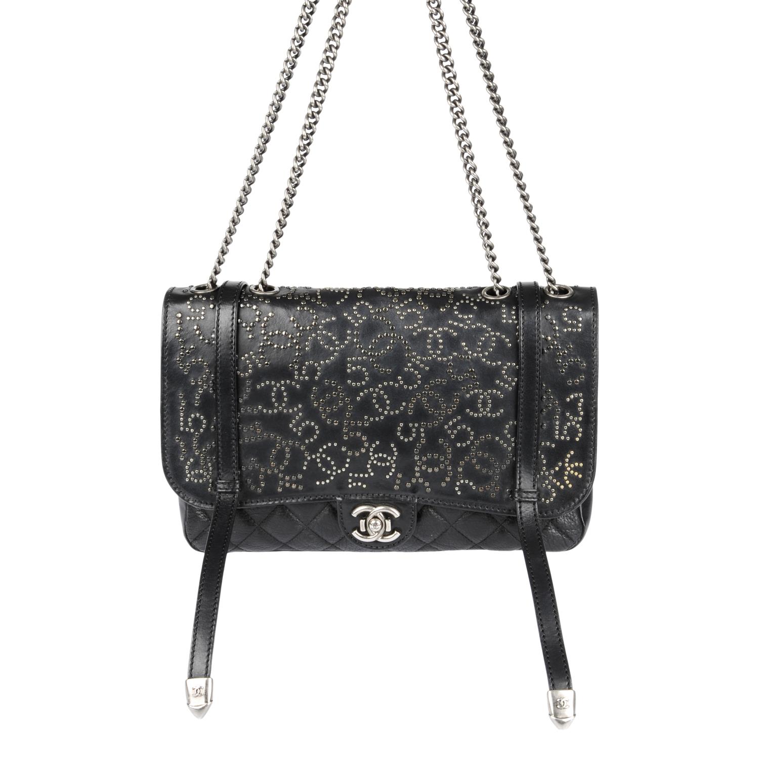 CHANEL - a Studded Dallas Flap handbag.