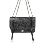CHANEL - a Studded Dallas Flap handbag.