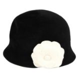 CHANEL - a black Camellia Cloche hat.