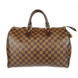 LOUIS VUITTON - a Damier Ebene Speedy 35 handbag.