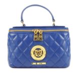 LOVE MOSCHINO - a quilted blue vanity handbag.