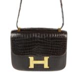 HERMÈS - a 1978 crocodile Constance handbag.