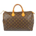 LOUIS VUITTON - a Monogram Speedy 35 handbag.